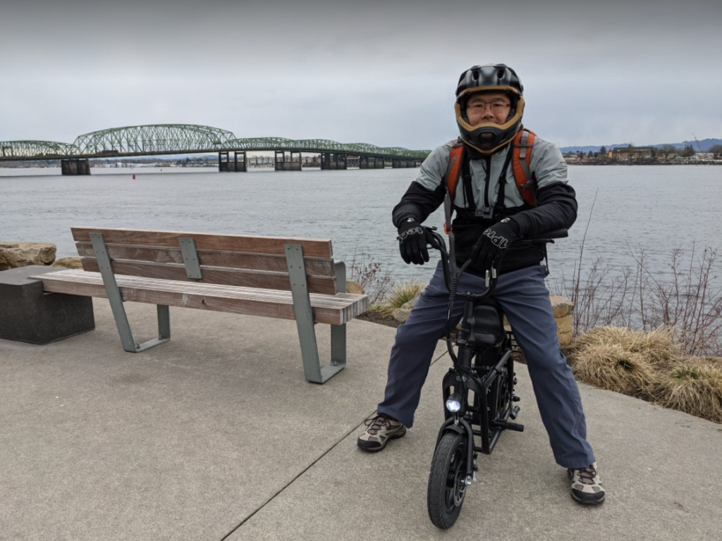 Jimmy on the Fiido along the Colombia River and Bridge to Portland