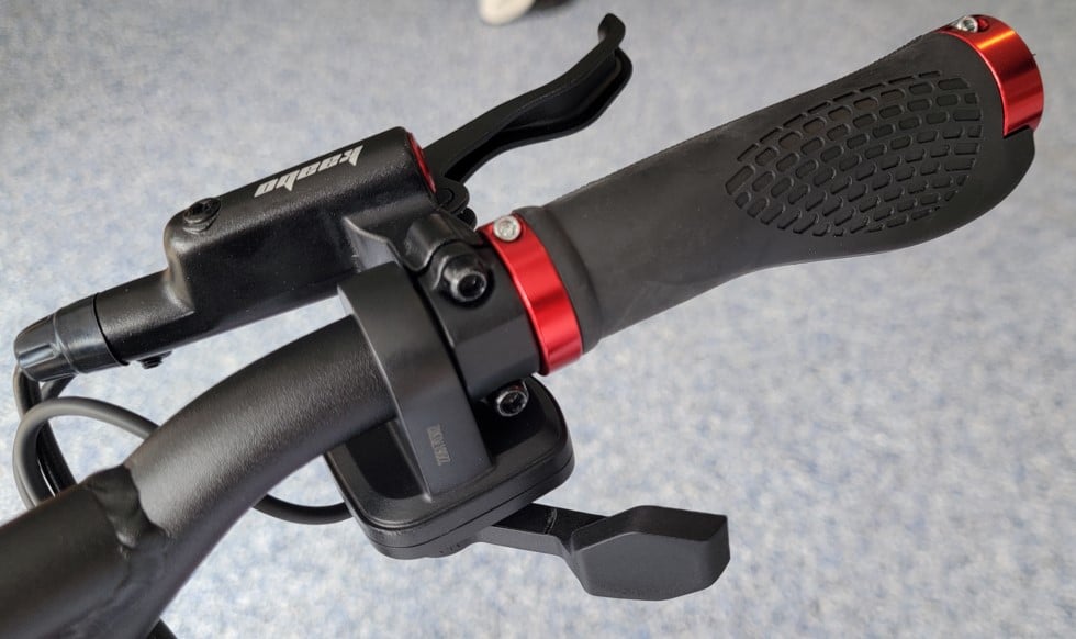 Wolf Warrior X GT right handlebar grip with thumb throttle that has a delay